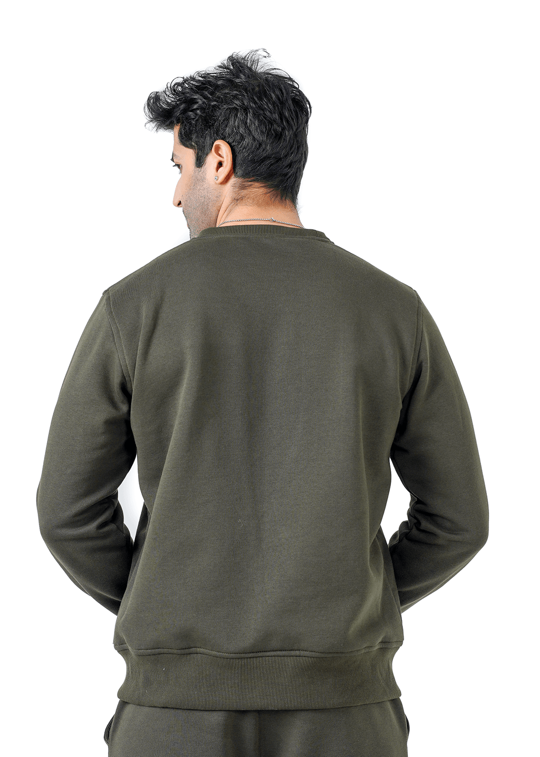 Man wearing a green sweatshirt on a white background