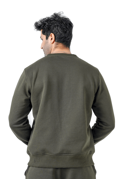 Man wearing a green sweatshirt on a white background