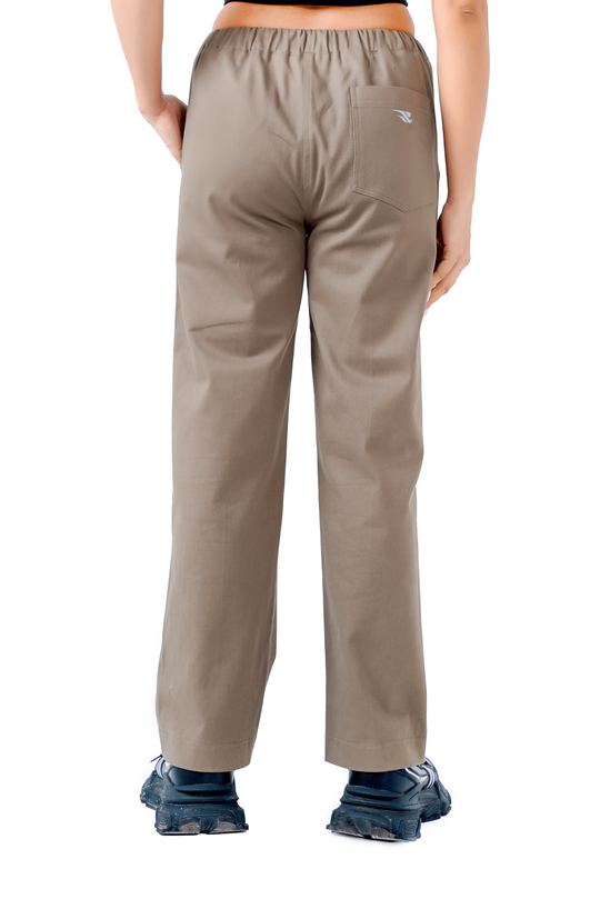 Person wearing beige pants on a white background